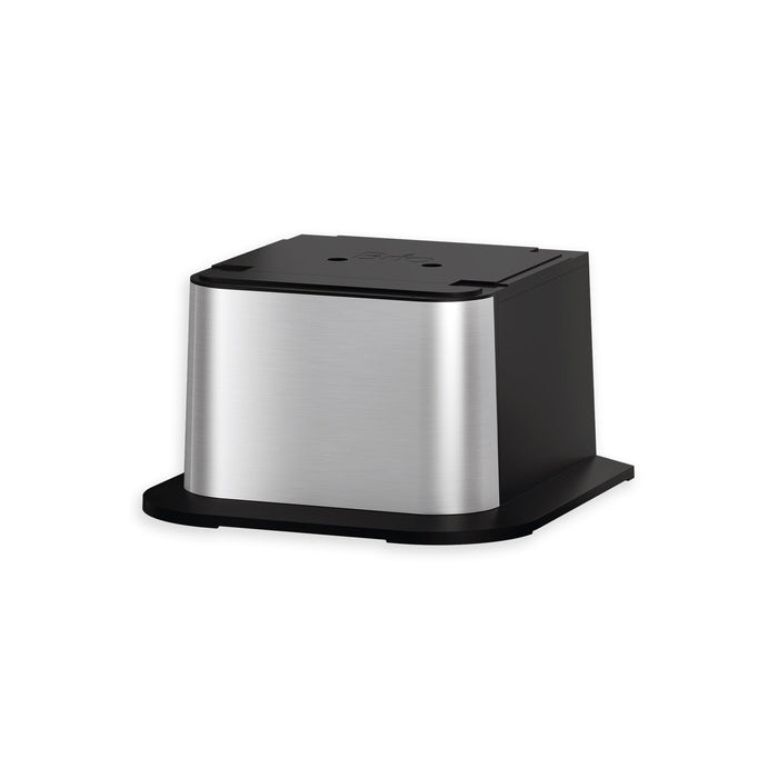 This is the Brio Water Cooler Base for the Brio 430 Series Bottled & Bottleless Water Cooler, featuring a compact, square-shaped design in stainless steel and black plastic, shown on a plain white background.