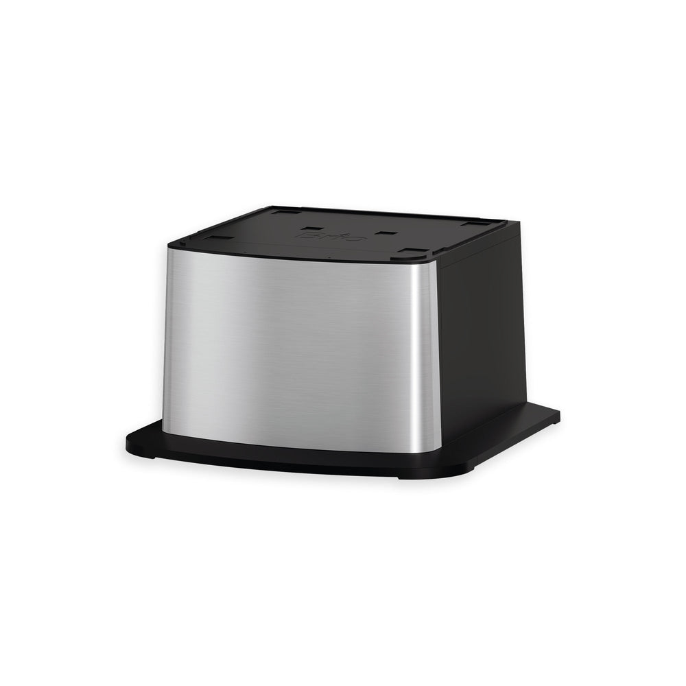 The Brio Water Cooler Base – 530 Series Bottled & Bottleless Water Cooler is a stainless steel rectangular box with a black base and top, resembling an electronic device or kitchen appliance, shown on a white background.