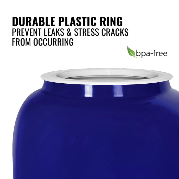 A close-up of the GEO Porcelain Ceramic Crock Water Dispenser w/ Stand in blue, featuring a white BPA-free plastic ring that prevents leaks and cracks. A green leaf BPA-free label is also visible.