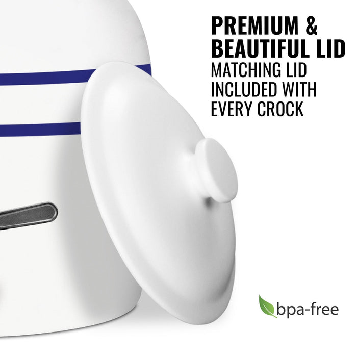 The GEO Porcelain Ceramic Crock Water Dispenser w/ Stand – Blue Stripe features a premium, BPA-free white ceramic crock with a blue stripe and matching lid. The included lid pairs perfectly with the wooden stand for stylish hydration.