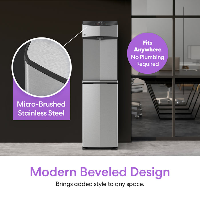 Stainless steel water dispenser with modern beveled design in a room setting.