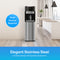The Brio 400 Series 4-Stage Reverse Osmosis Bottleless Water Cooler in stainless steel enhances a modern kitchen with wooden floors and pendant lights. A blue circle says Drain Hookup Required. Text: Elegant Stainless Steel – Modern design, advanced filtration, durability.