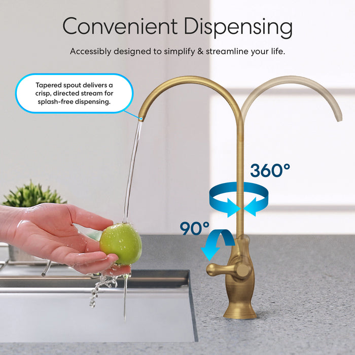 A hand washes a green apple under the Brio Curvy Classic Series Water Faucet – Brushed Gold, featuring a 360° rotating spout, splash-free directed stream, and user-friendly design as water flows smoothly into the sink.