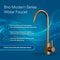 The Brio Modern Series Water Faucet – Brushed Bronze is shown on a blue background, featuring a swan-neck design, rust protection, lead-free stainless steel, and a stylish brushed bronze finish.