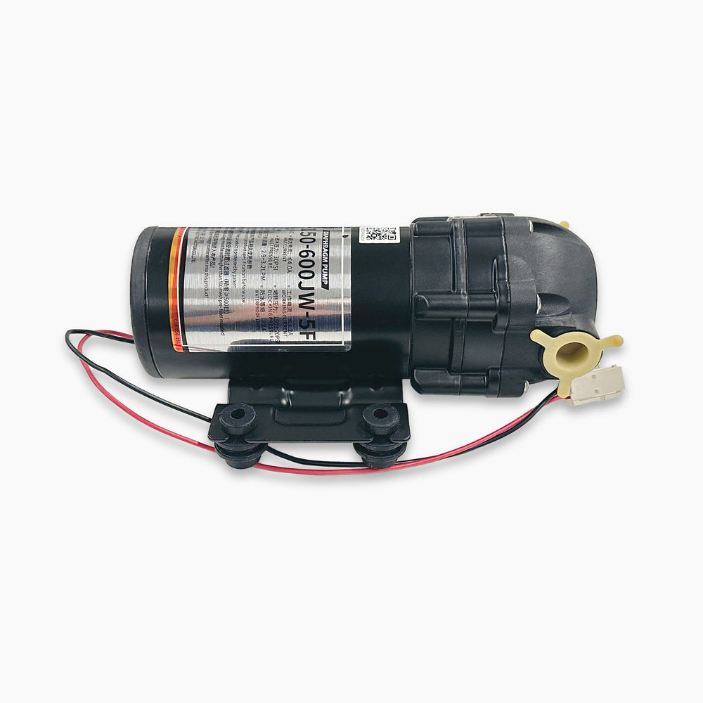 A black Diaphragm Pump for PRISM Tankless Units with a silver label, red/black wires, and a yellow connector—perfect as a compatible replacement or accessory for your TROE600PRISM, shown on a white background.