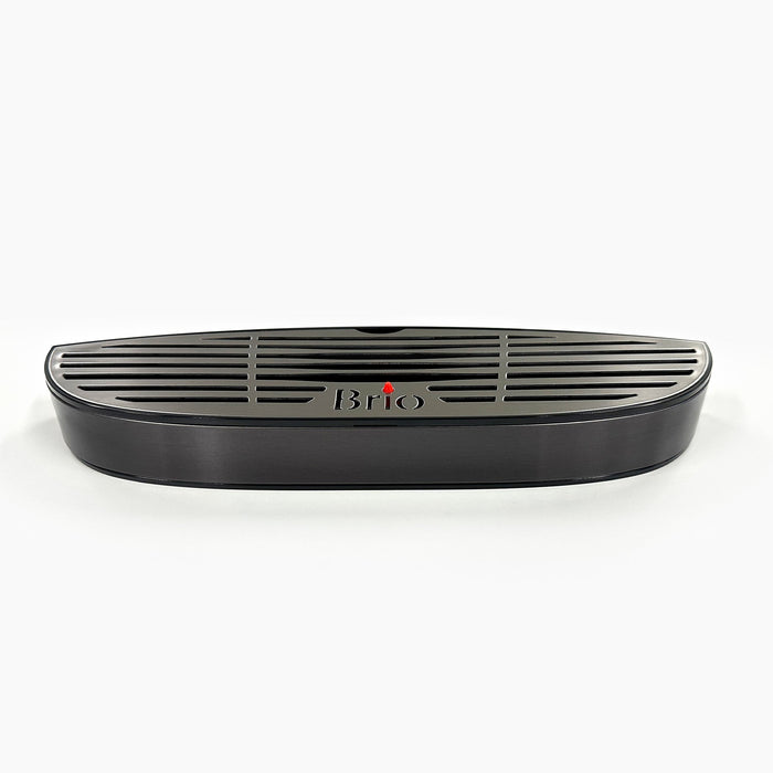 A black Drip Tray 720 Series Cooler, model CLBL720SCXBLK, featuring an oval shape and horizontal vent slats with "Brio" on the front, displayed against a white background.