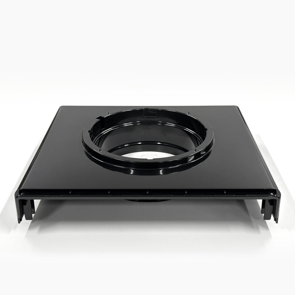 The Top Lid 520 for Top Load Coolers is a black rectangular plastic component with a large central circular opening. Seen from the front, it features raised edges and a glossy finish that gives it a sleek look.