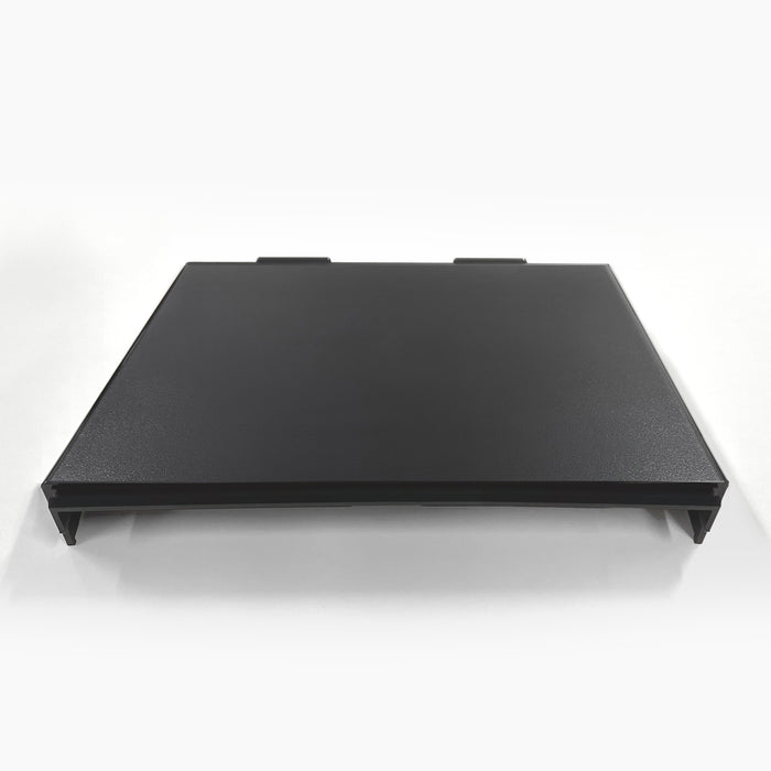A black, rectangular Top Cover for Brio 320, 420 & 520 Series Icemaker Coolers with two tabs on the back edge, shown flat on a white surface against a plain white background.