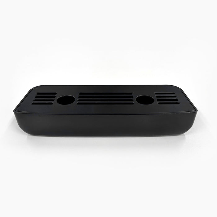 The Drip Tray and Cover 320S Black Slim Top Load is a black rectangular plastic tray with rounded corners, two circular holes, and multiple horizontal slits on top, designed for CLPOU320BSLUV2P, shown on a white background.