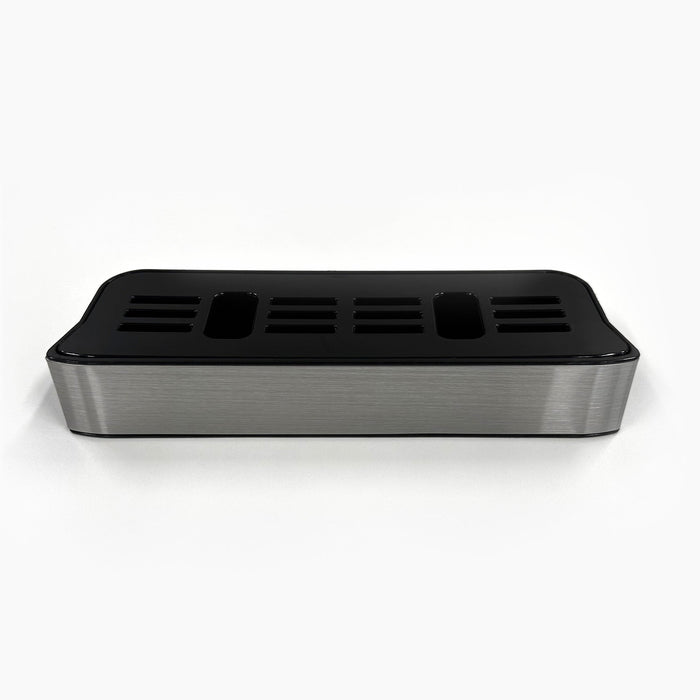 The Drip Tray and Cover 320S Stainless Slim Top Load is a stainless steel and black plastic tray with multiple vertical slots, designed for organizing utensils and compatible with CLPOU320SLUV2P water filter systems.
