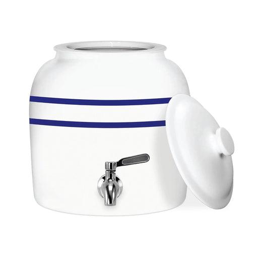 The GEO Porcelain Ceramic Crock Water Dispenser – Blue Stripe features a white ceramic body with two blue stripes, metal spigot, and removable lid. A BPA-free alternative to traditional 5-gallon water bottles, set against a plain white background.