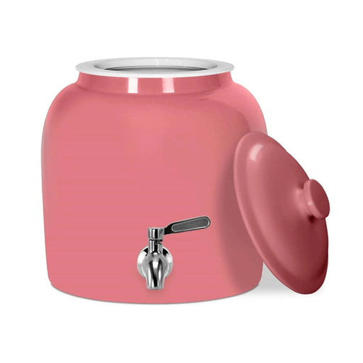 The GEO Porcelain Ceramic Crock Water Dispenser in pink, BPA-free with a matching removable lid and silver spigot, designed for 5-gallon bottles, is displayed on a white background.